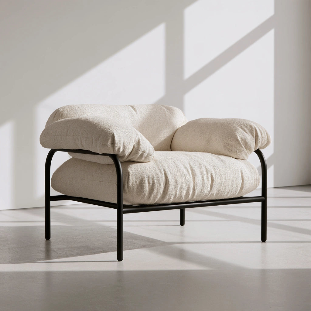 Ulmirae modern black metal accent armchair with tubular frame, suitable for living rooms and stylish home décor.